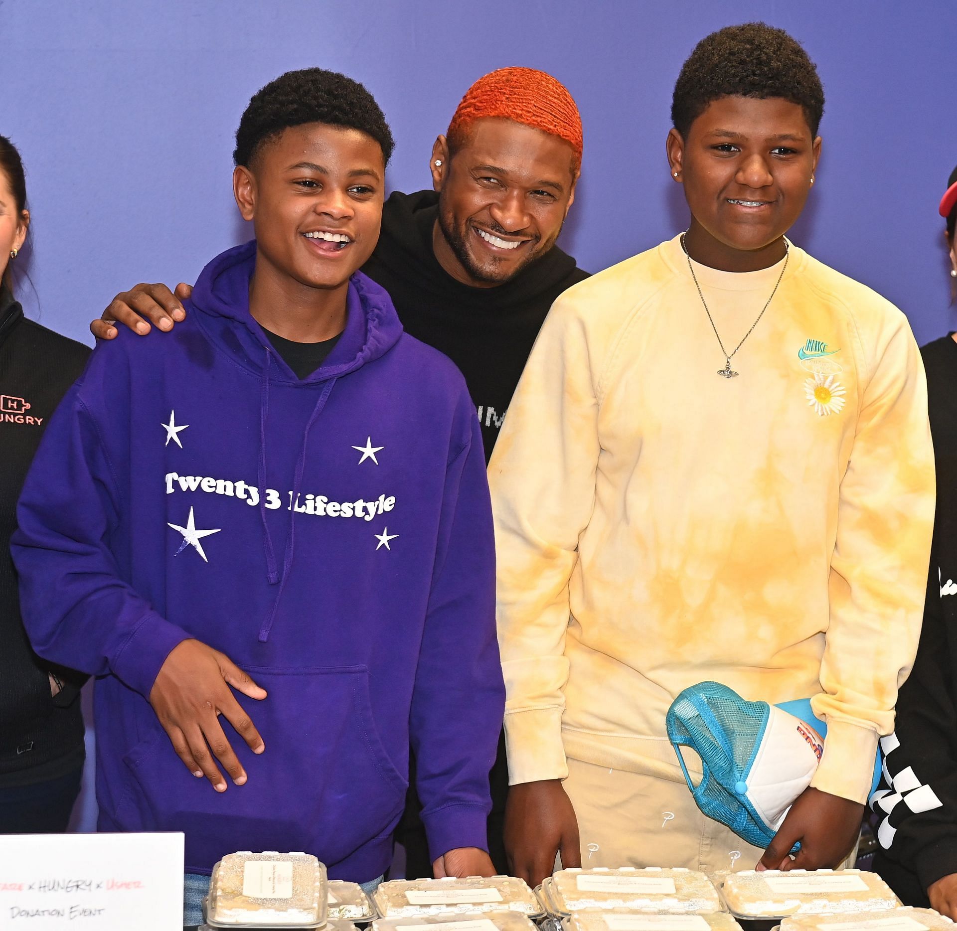 Usher with his two sons, "Cinco" Raymond V and Naviyd Ely Raymond. - (Image via Getty)